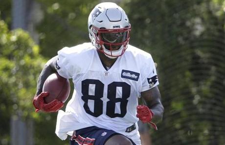 New England Patriots tight end Martellus Bennett performs field drills during an NFL football training camp practice Thursday, July 28, 2016, in Foxborough, Mass. (AP Photo/Steven Senne)
